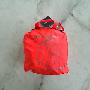 Eddie Bauer Bright Red/Orange Stowaway Packable Backpack